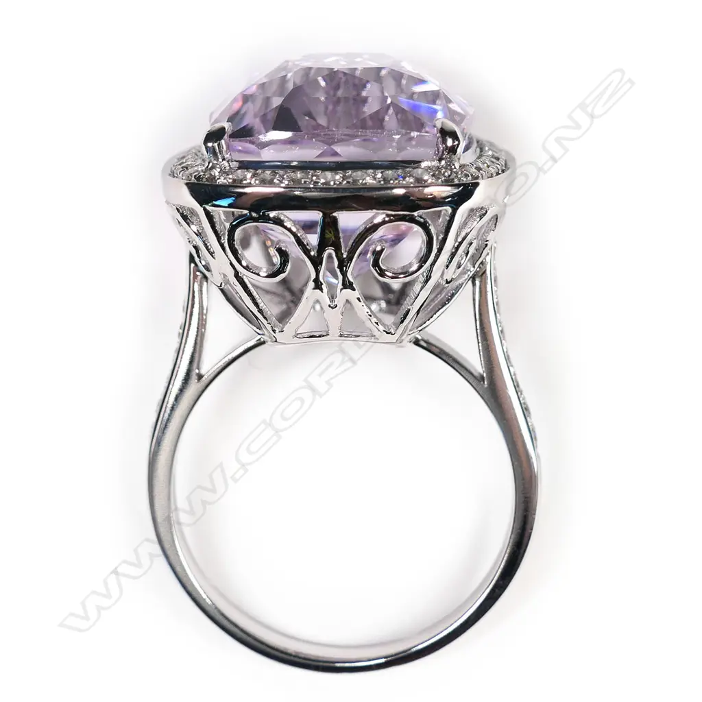 A 14ct white gold, kunzite and diamond halo ring, Image 1++