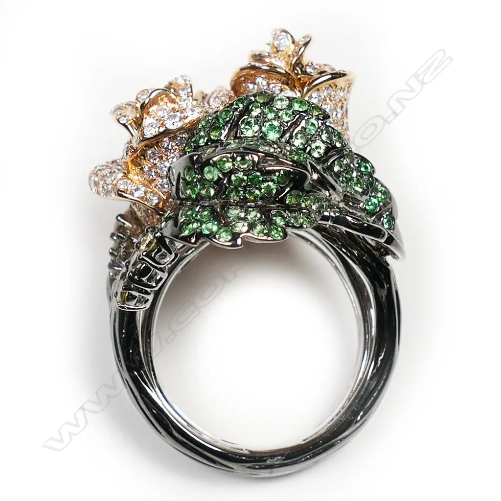 An impressive 18ct rose, white and black gold diamond and tsavorite garnet dress ring, Image 1++