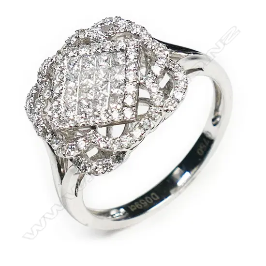 An 18ct white gold and diamond cluster ring,