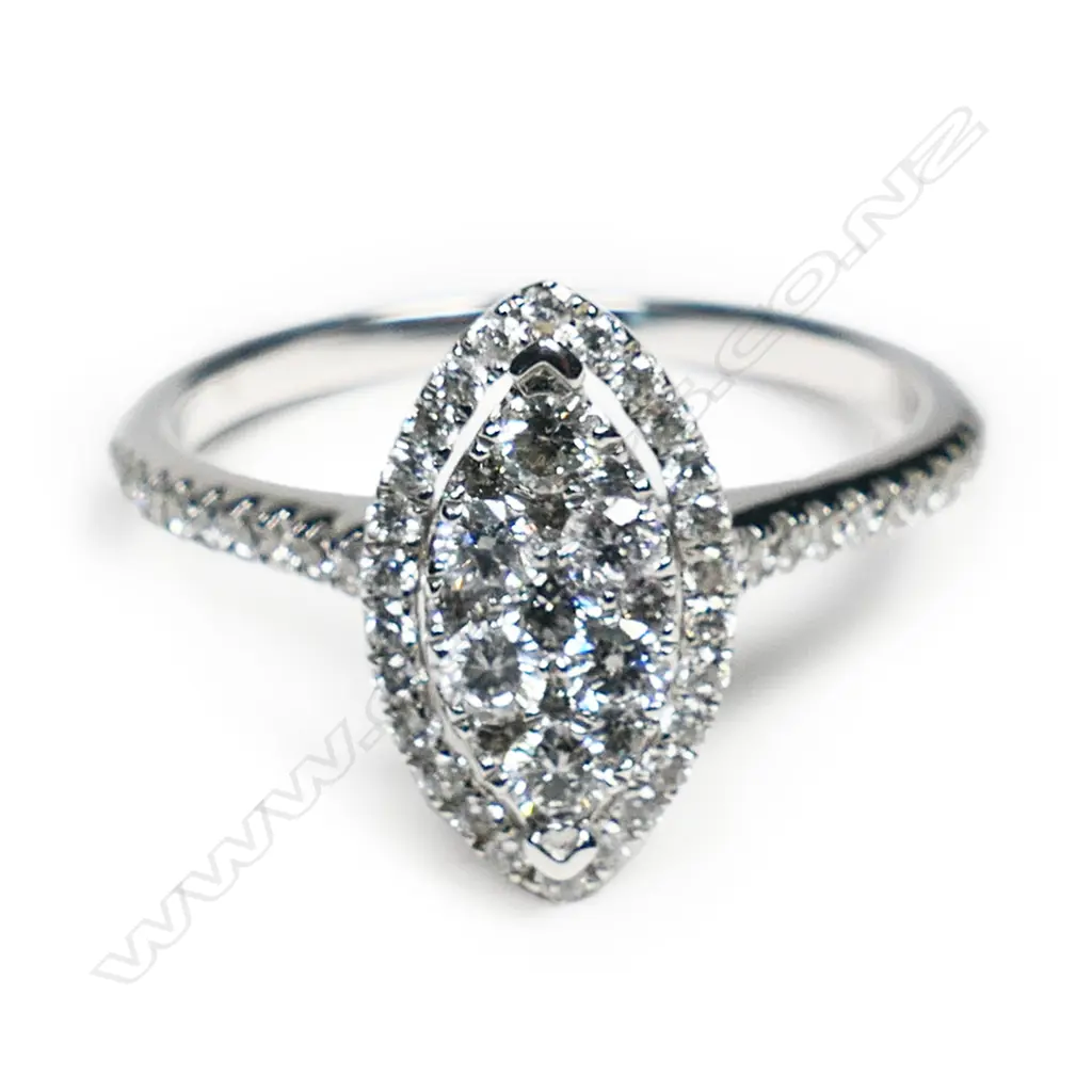 An 18ct white gold and diamond cluster ring, Image 1++