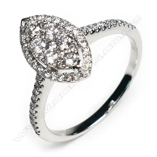 An 18ct white gold and diamond cluster ring,