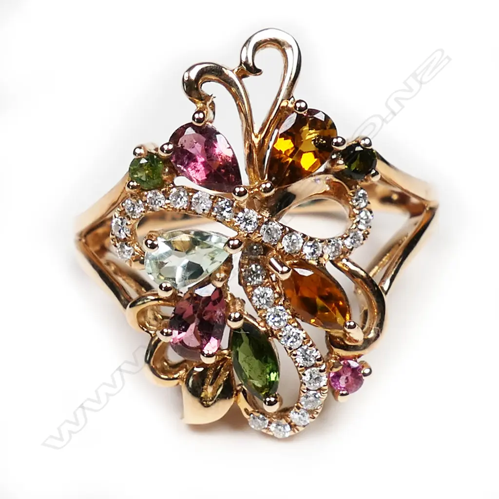 An 18ct rose gold and tourmaline set dress ring Image 1++