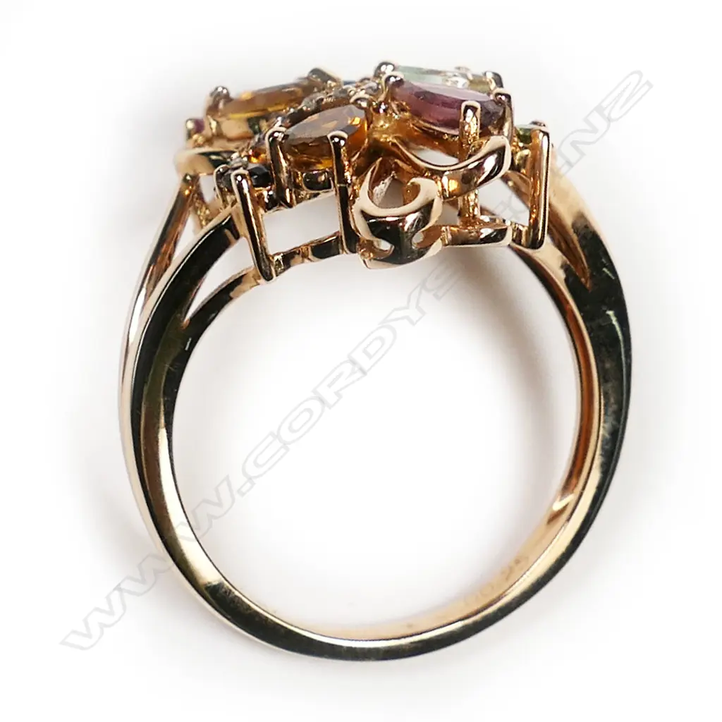 An 18ct rose gold and tourmaline set dress ring Image 1++