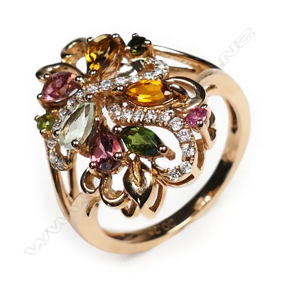 An 18ct rose gold and tourmaline set dress ring