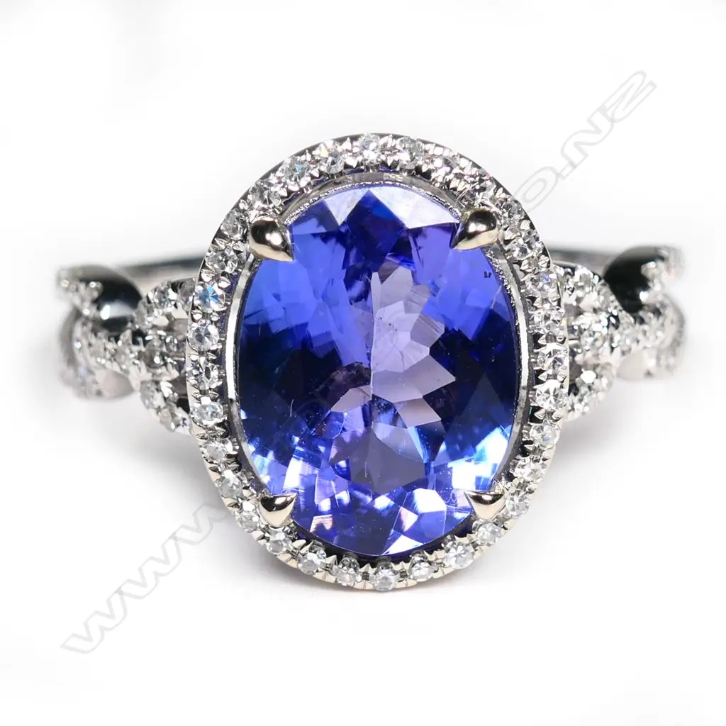 An 18ct white gold, tanzanite and diamond ring, Image 1++