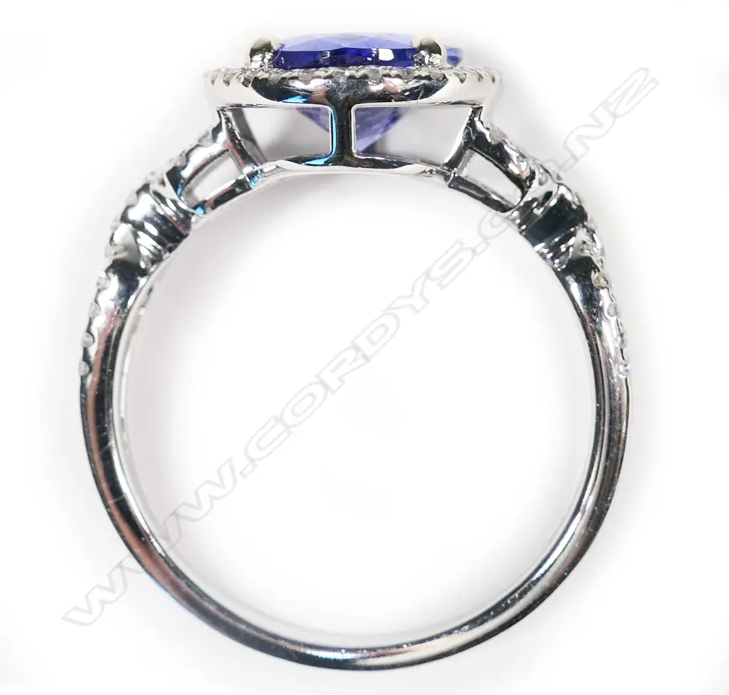 An 18ct white gold, tanzanite and diamond ring, Image 1++