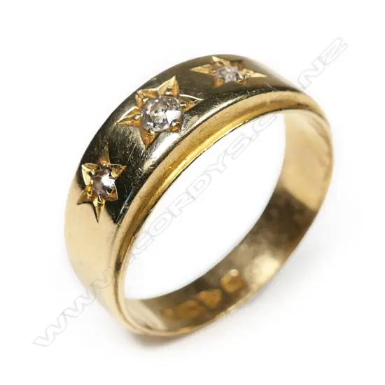 An early 20thC 18ct and three stone diamond ring.