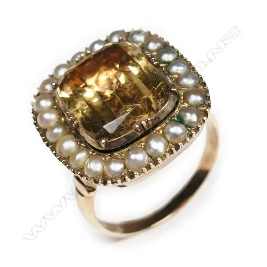 An antique 15ct gold yellow sapphire and seed pearl ring,
