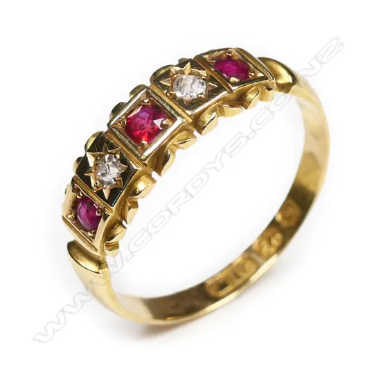 A Victorian 18ct gold ruby and diamond band ring,