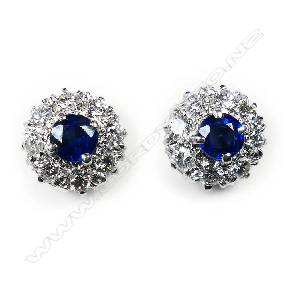 A pair of platinum and 18ct white gold, sapphire and diamond stud earrings, Image 1++