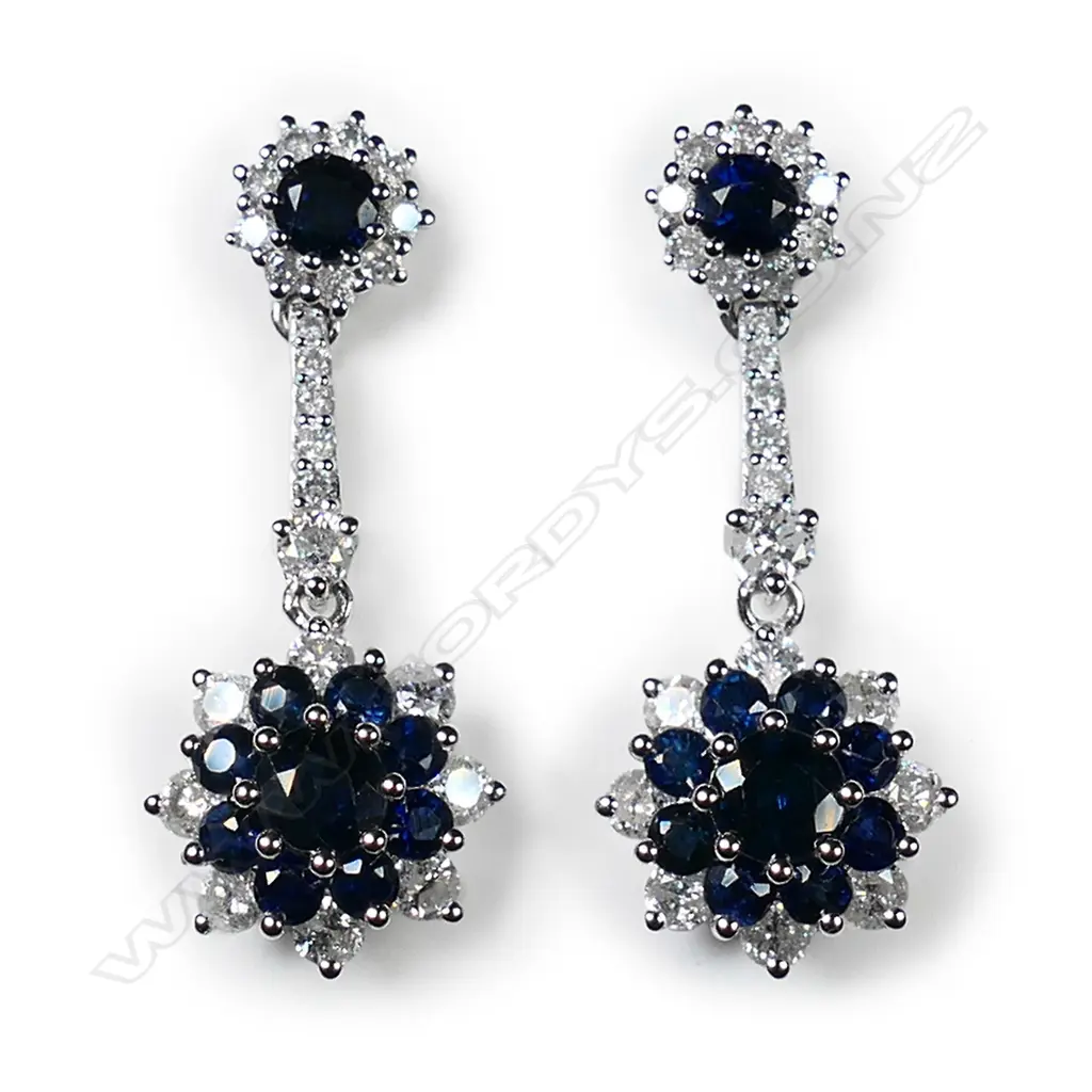A pair of 14ct white gold, sapphire and diamond floral design drop earrings, Image 1++