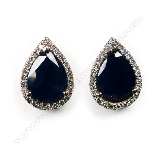 A pair of 14ct rose gold sapphire and diamond halo stud earrings,