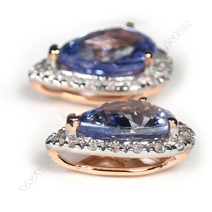 A pair of 14ct rose gold, Ceylon sapphire and diamond stud earrings, Image 1++