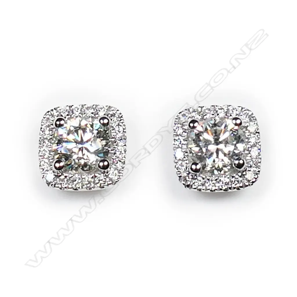 A pair of 18ct white gold and diamond halo stud earrings, Image 1++