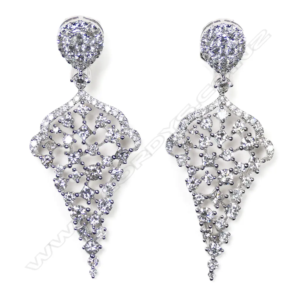 A pair of 18ct white gold and diamond drop earrings, Image 1++