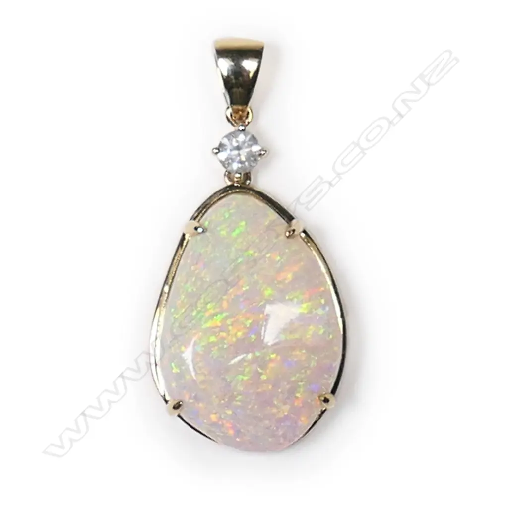 A 14ct gold, opal and diamond drop pendant, Image 1++