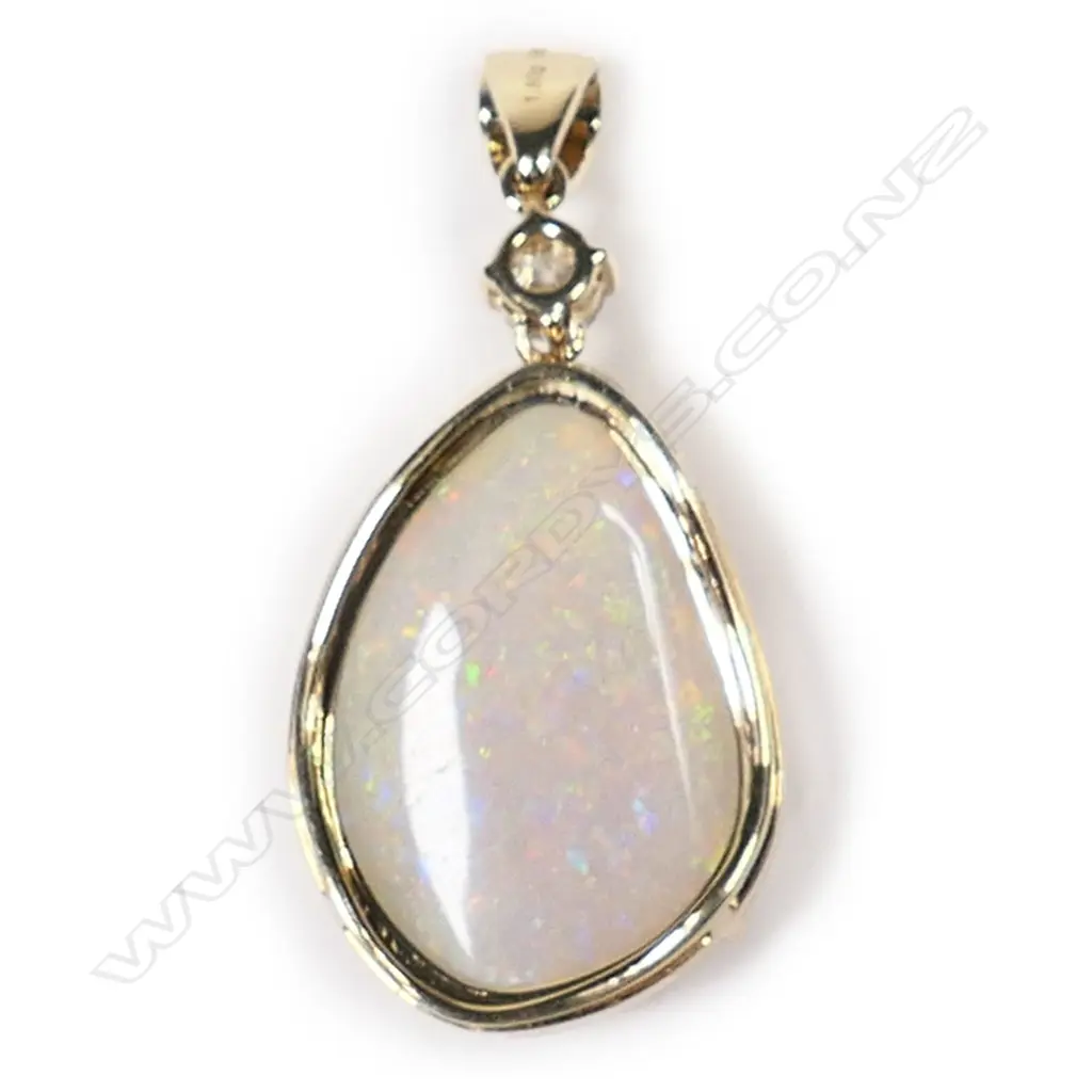 A 14ct gold, opal and diamond drop pendant, Image 1++