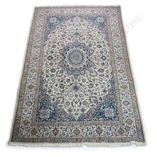 An Iranian Nain hand knotted carpet