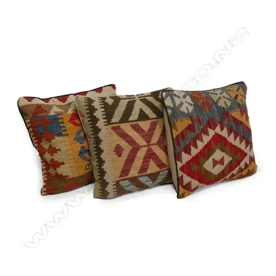 Three Afghan kilim faced scatter cushions,