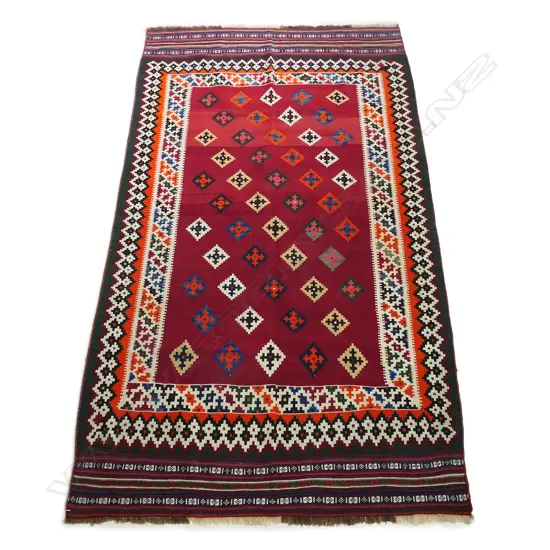 A finely woven Persian kilim,