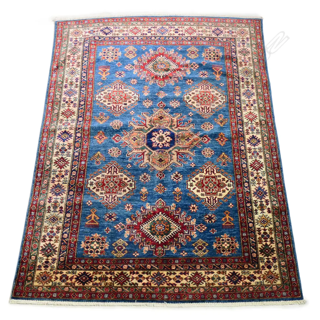 A hand knotted wool pile Kazak rug, Image 1++