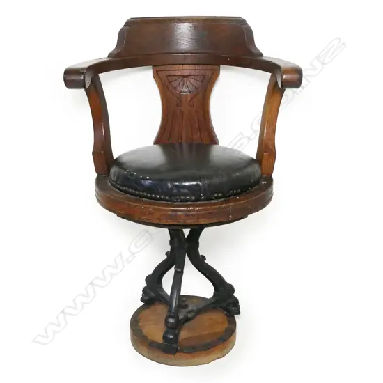 A c.1900  carved oak ship's salon chair,