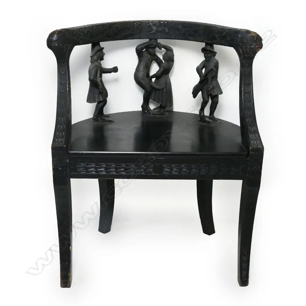 A 19thC European carved and ebonised figure back chair, Image 1++