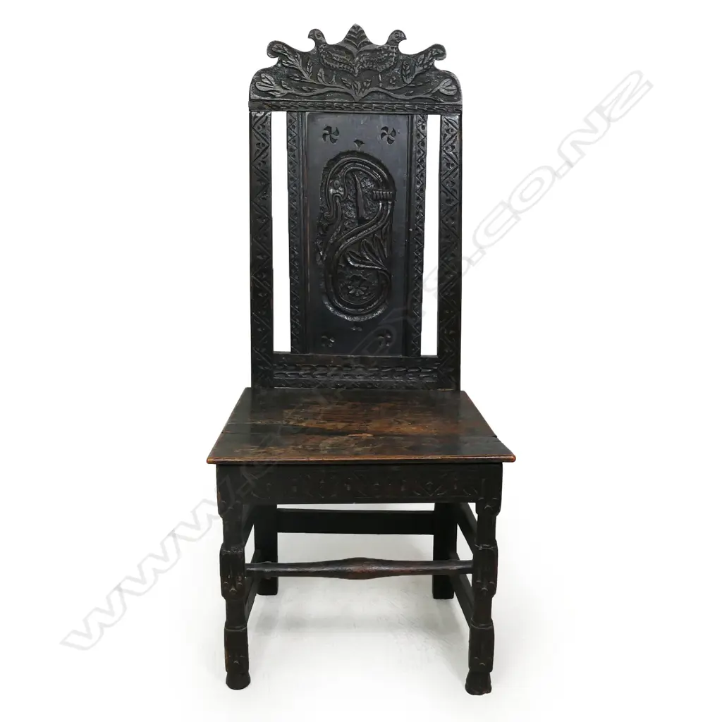 An antique country oak carved chair, Image 1++
