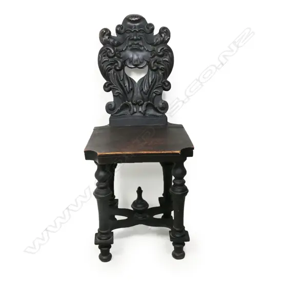 A 19thC European ebonised Gothic hall chair,