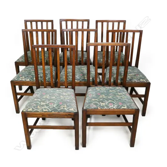 A set of eight Georgian oak Sheraton style dining chairs,