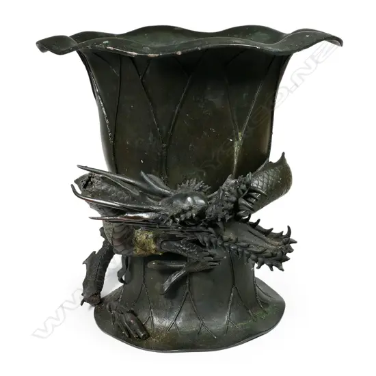An old Oriental bronze floor standing jardiniere,