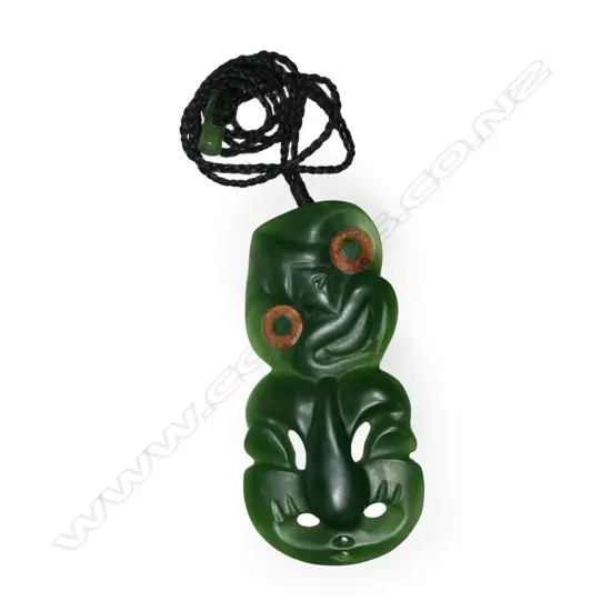 A vintage pounamu hei tiki, of kawakawa variety,