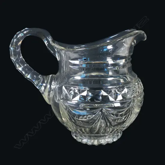 A cut crystal jug,