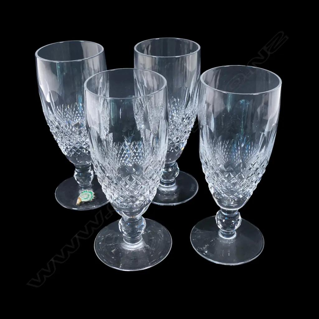 A set of four Waterford crystal champagne flutes, Image 1++