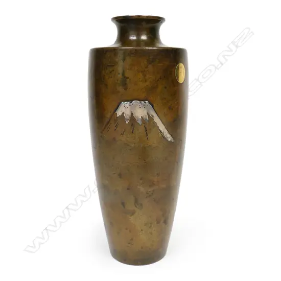 A Japanese bronze vase inlaid with gold and silver,