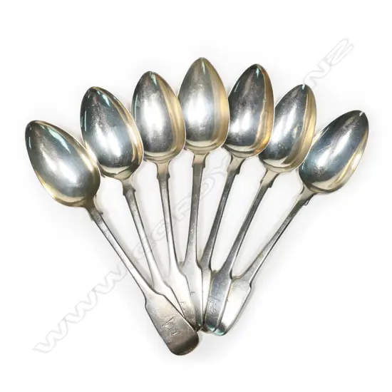 Seven Irish and English 19thC silver fiddle pattern tablespoons,