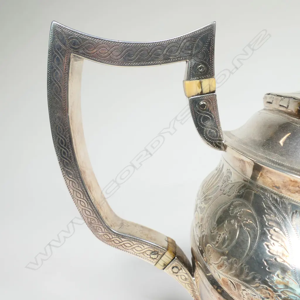 A George III silver teapot Image 1++