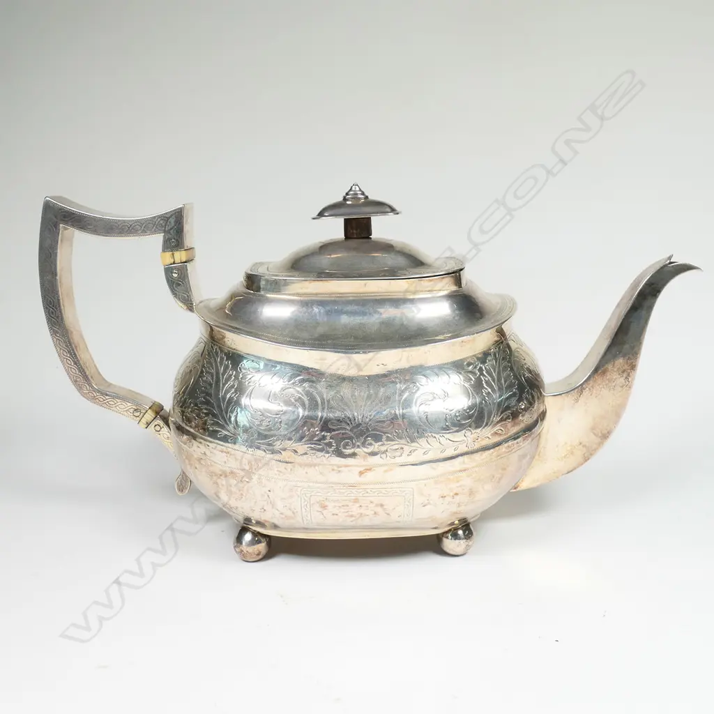 A George III silver teapot Image 1++
