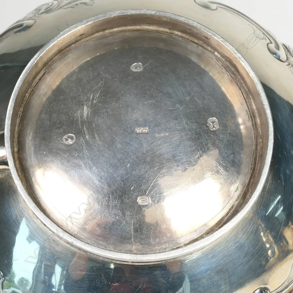 A Victorian silver teapot, with ornate floral repousse decoration, Image 1++