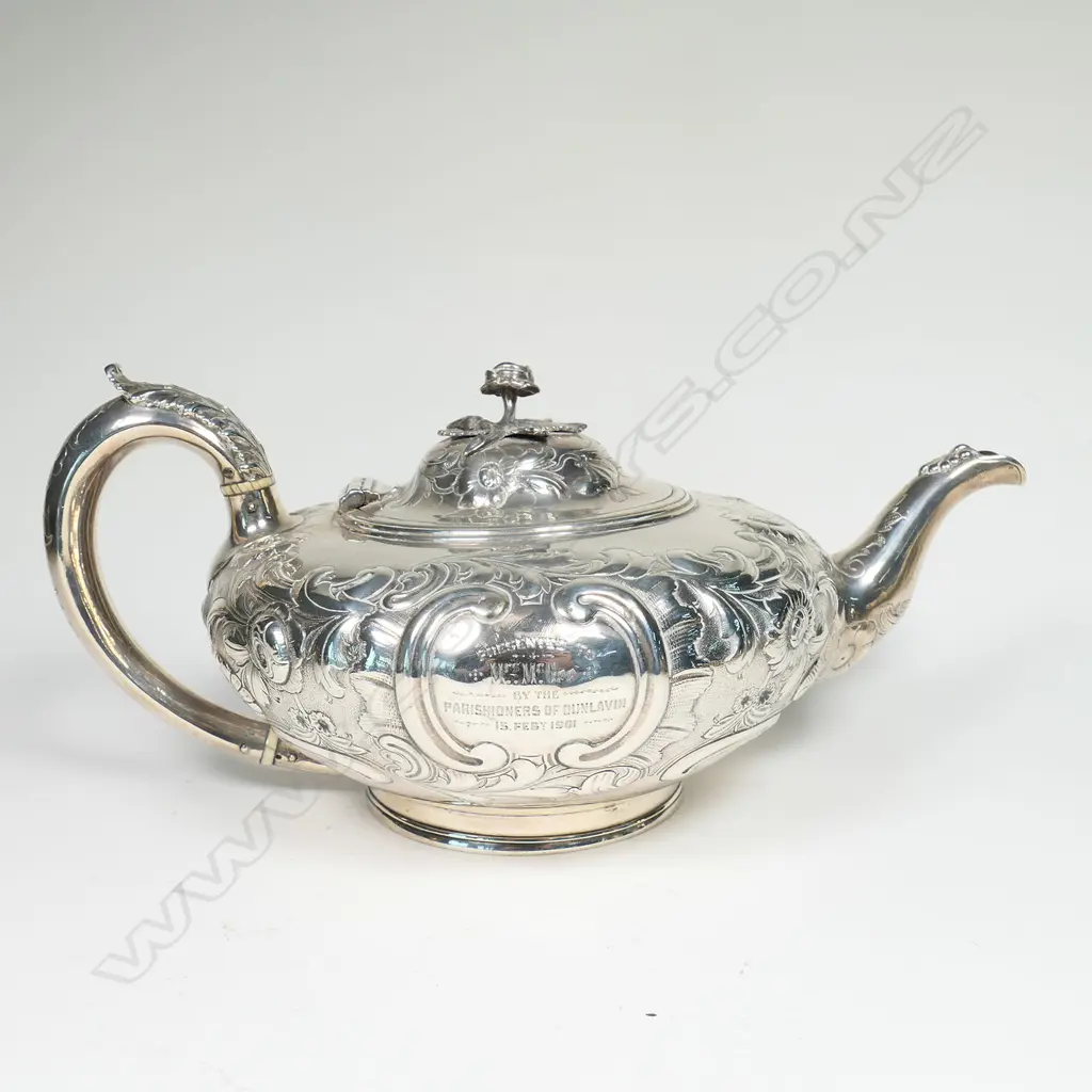 A Victorian silver teapot, with ornate floral repousse decoration, Image 1++