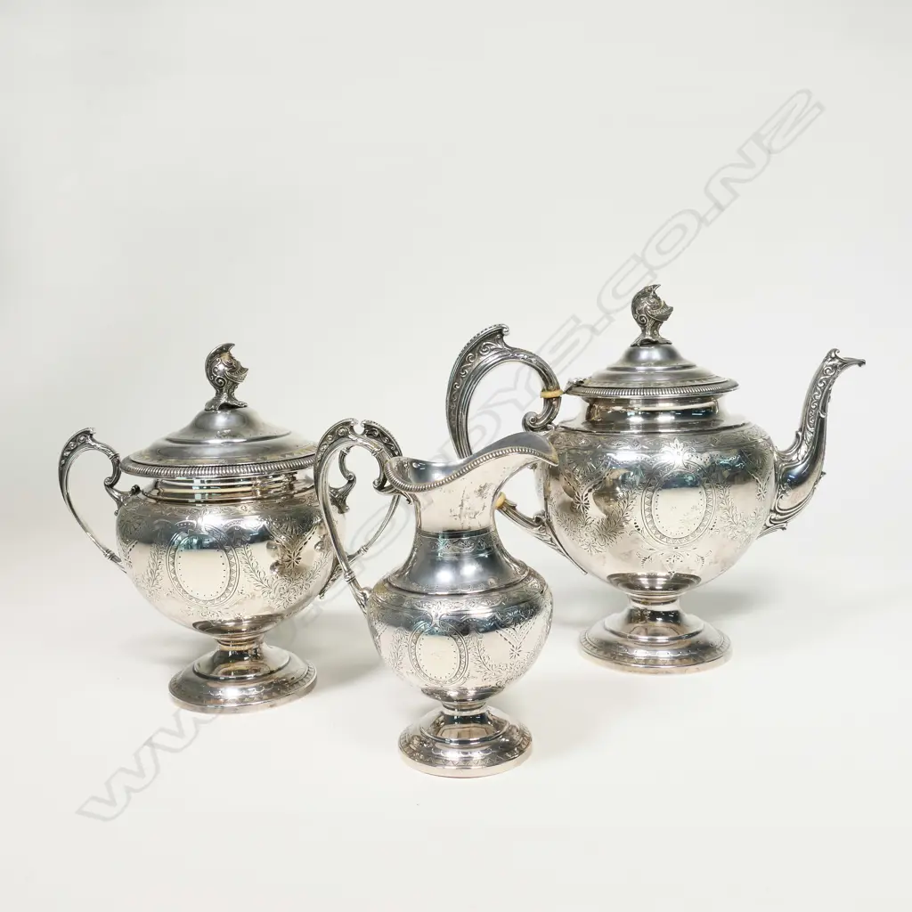 A heavy, Victorian silver three-piece tea set, Image 1++