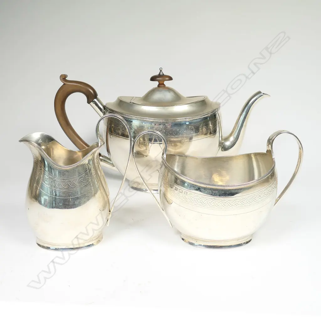 A Georgian Revival silver three-piece tea set, Birmingham 1919 by Horace Woodward & Co. Ltd., Image 1++