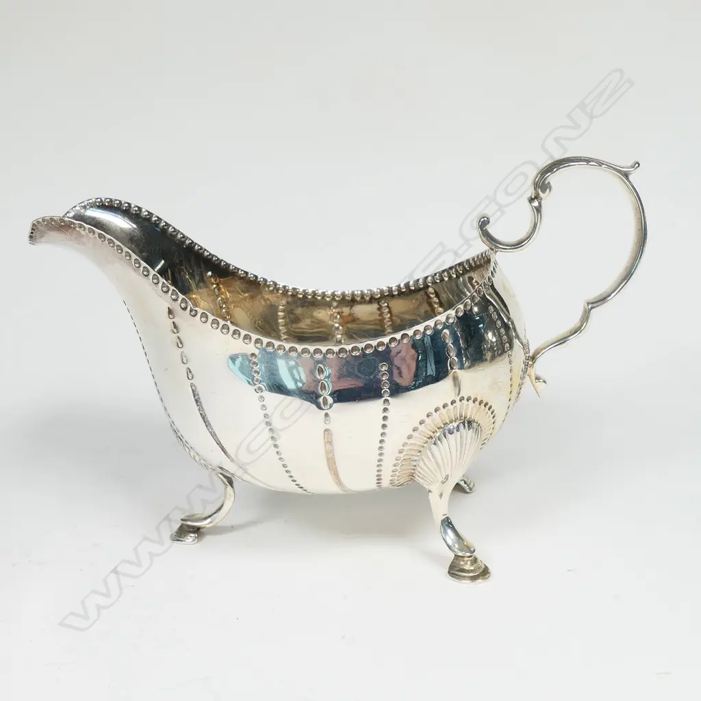An Edwardian silver sauce boat, in early Georgian style, Image 1++
