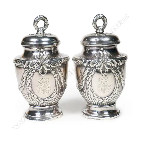 A pair of French 19thC silver pepper grinders,