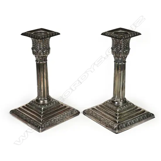 A pair of Victorian silver column candlesticks,