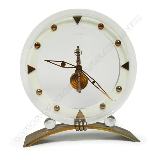A Jaeger-LeCoultre Perspex and gilt metal skeleton table clock,