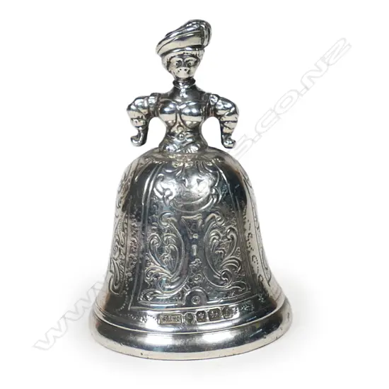 A small silver table bell with figured finial,