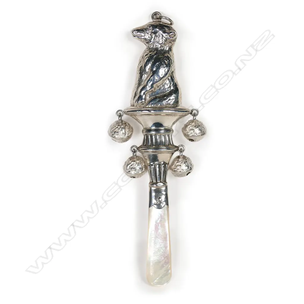 An early 1900s silver and mother of pearl baby rattle, Image 1++