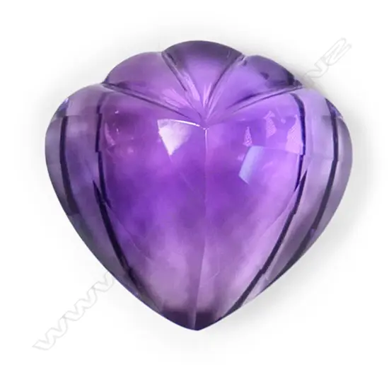 A 24.00ct heart shaped amethyst unset gemstone,