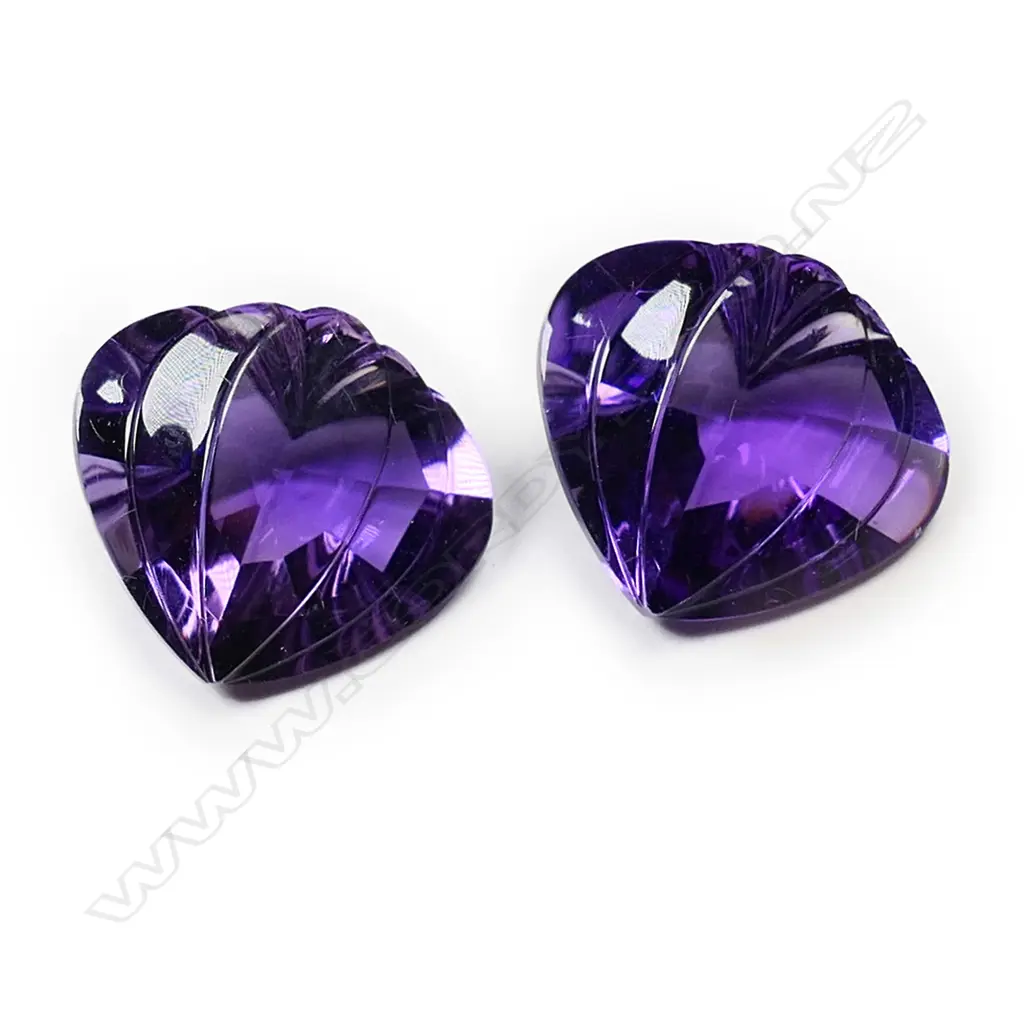 A pair of 9.00ct heart shaped amethyst unset gemstones, Image 1++